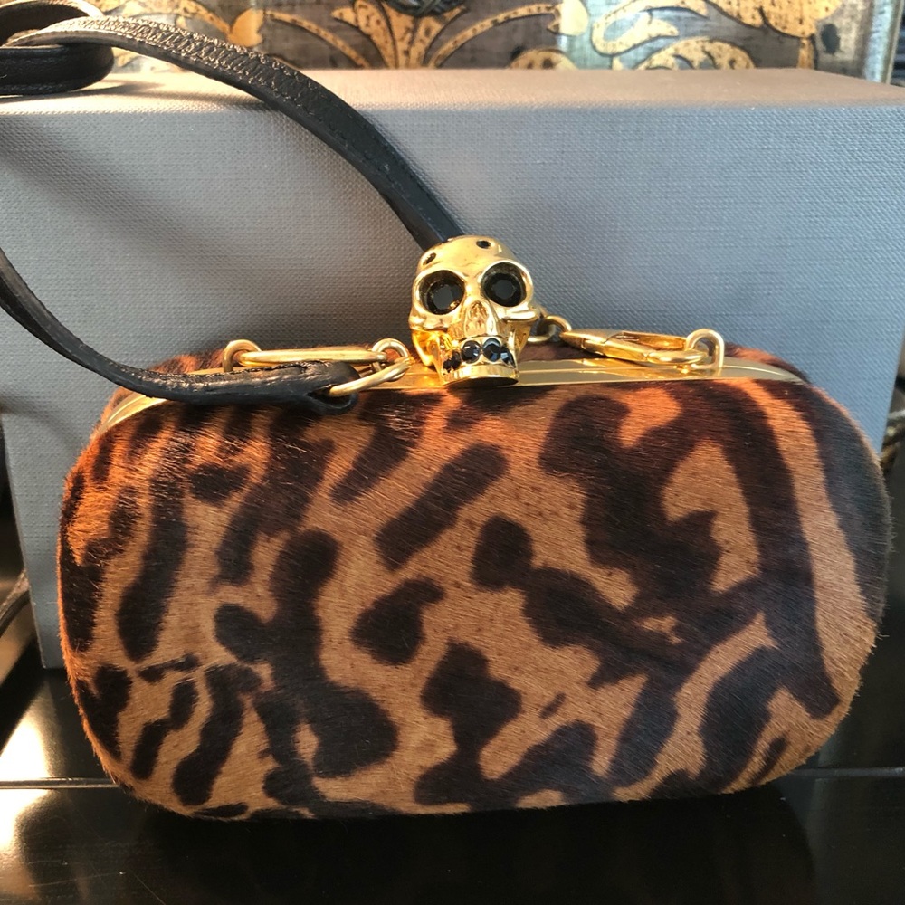 Alexander McQueen leopard skull clutch